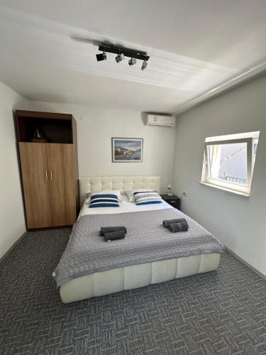 Cama o camas de una habitación en Studio apartman Bačvice