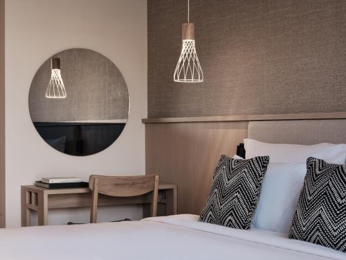 Letto o letti in una camera di Cora Hotel & Spa