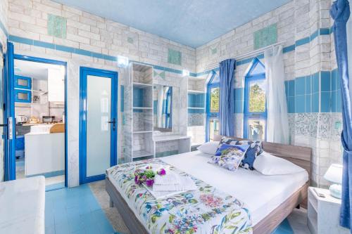 Ένα ή περισσότερα κρεβάτια σε δωμάτιο στο Paco's Resort Superior Villa 9