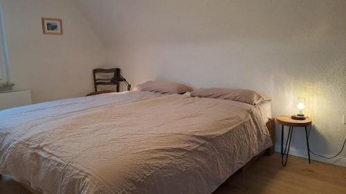 Ένα ή περισσότερα κρεβάτια σε δωμάτιο στο Ferienhaus Charlie