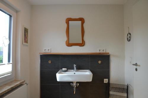 Ένα μπάνιο στο Ferienhaus Charlie