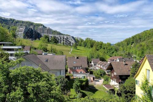a small town in the mountains with houses at Dein Haus für den Zürich-Trip! in Adliswil