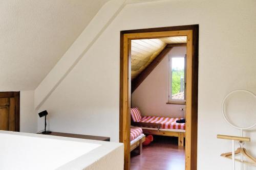 a living room with a couch and a window at Dein Haus für den Zürich-Trip! in Adliswil