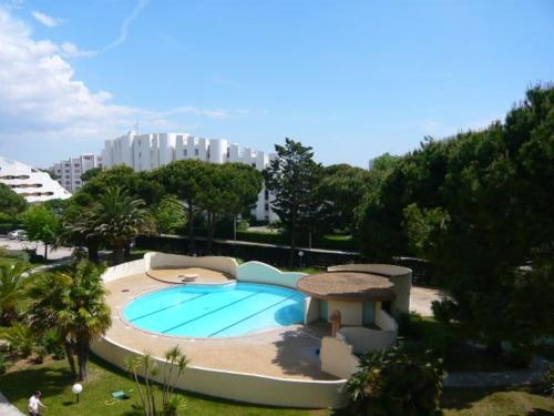 Appartement T2 Cabine, Piscine, Proche Plage et Commerces, Quartier Animate, Garage Inclus - FR-1-328-207