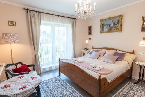 Postel nebo postele na pokoji v ubytování Eperkert Vendégház
