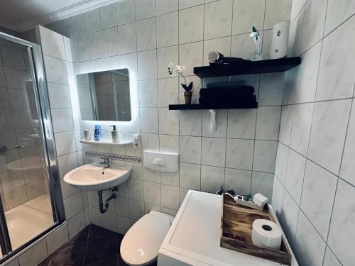 Koupelna v ubytování FeWo Burgquartier Ritterlich & Zentral