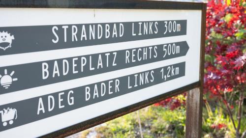 a sign for the abbeybaditz recreates the gardens at Pension Hanslmann in Steinbach am Attersee