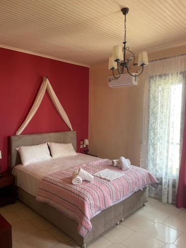 Postel nebo postele na pokoji v ubytování Nirvana Hotel