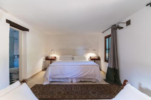 Postel nebo postele na pokoji v ubytování Scratch House Hotel Boutique
