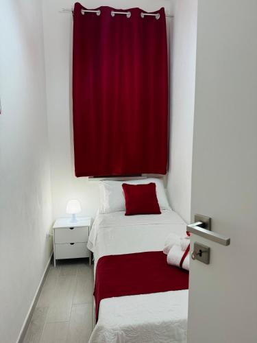 Postel nebo postele na pokoji v ubytování Sirio rooms and apartments