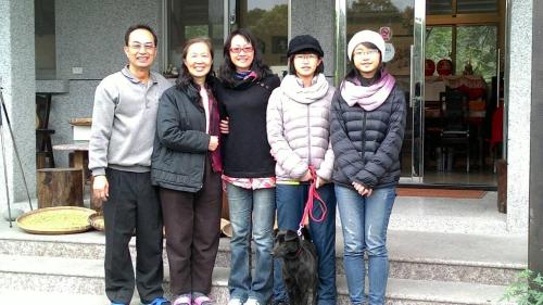a group of people standing in front of a building at Taroko Sialin Coffee Farm Homestay in Xiulin
