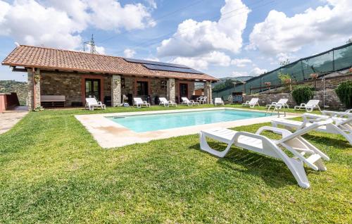 a villa with a swimming pool and a house at Pet Friendly Home In Torchiara in Torchiara