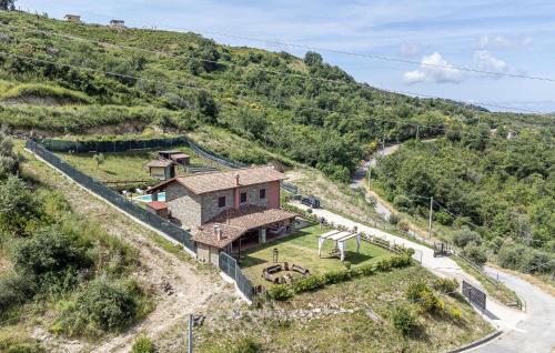 a house on the side of a hill at Pet Friendly Home In Torchiara in Torchiara