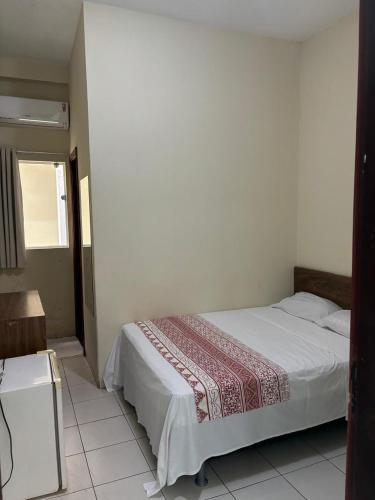 Postel nebo postele na pokoji v ubytování San Felipe Hotel
