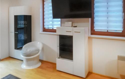 A television and/or entertainment centre at Ferienwohnung Auf 2 Etagen