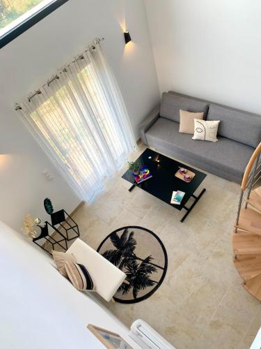 Χώρος καθιστικού στο Résidence 3 étoiles Pietra Gemina - Appartements de vacances, au calme, avec Piscine