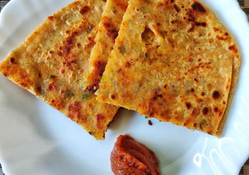 two pieces of food on a white plate at Baga Vista in Baga