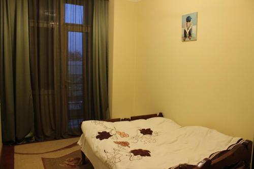 Voodi või voodid majutusasutuse Mari's Apartment Kazbegi toas