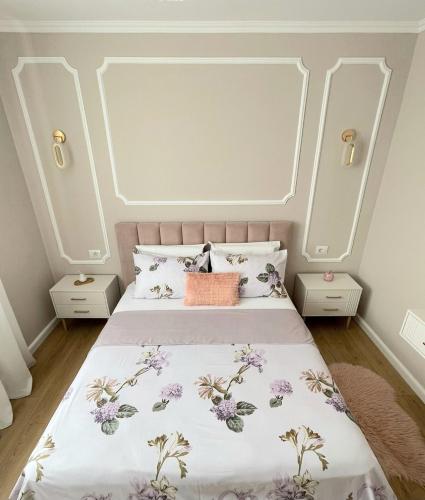 Postel nebo postele na pokoji v ubytování Vilma Apartment