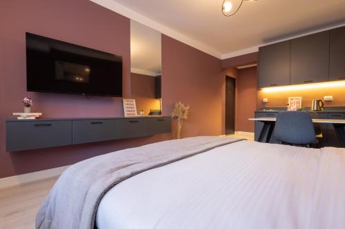 Letto o letti in una camera di Prishtina City Apartments
