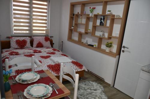 Ένα ή περισσότερα κρεβάτια σε δωμάτιο στο Apartments Mensa