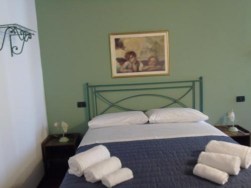 Postel nebo postele na pokoji v ubytování Tasi apartaments