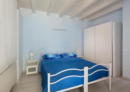 Una cama o camas en una habitación de CasaSoleMare