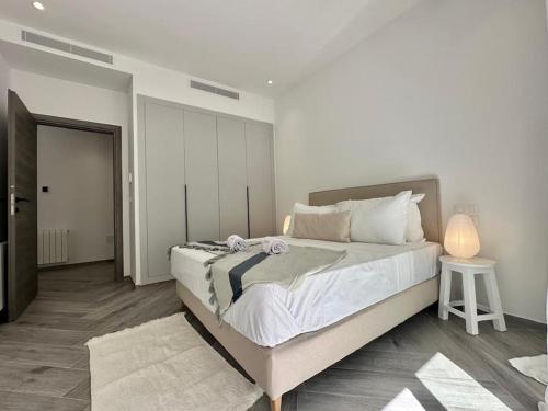 Postel nebo postele na pokoji v ubytování Hermès Appartement