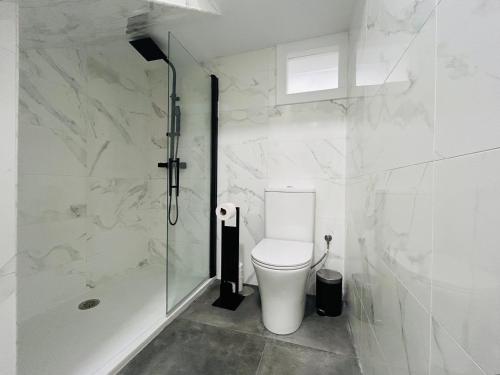 Ένα μπάνιο στο Apartamento en Camariñas