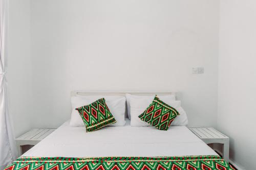 Postel nebo postele na pokoji v ubytování Avana Jayna Resort Watamu