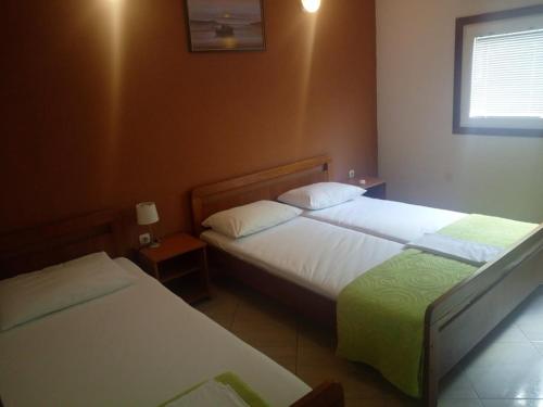 Posteľ alebo postele v izbe v ubytovaní Apartments Salamun