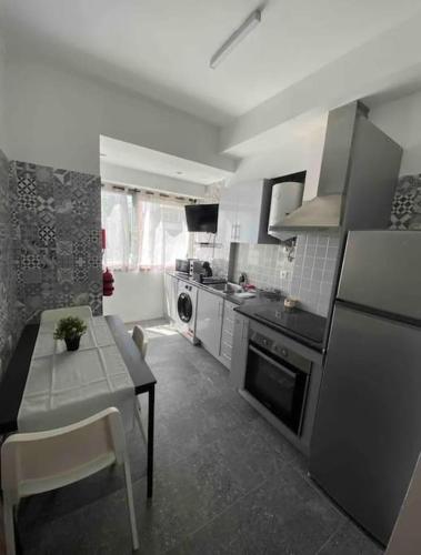 Η κουζίνα ή μικρή κουζίνα στο Rs AL Cesario Verde 9 - Oeiras