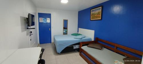 Televisyen dan/atau pusat hiburan di Guest House Renascer K&W