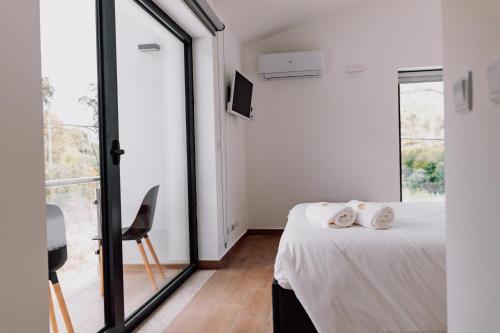 Letto o letti in una camera di Quinta dos Sinçais