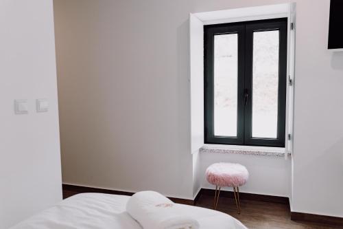 Letto o letti in una camera di Quinta dos Sinçais