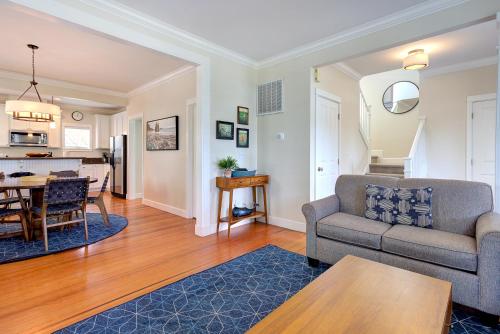 a living room with a couch and a table at Our Family Beach House by Seabrook Hospitality in Pacific Beach