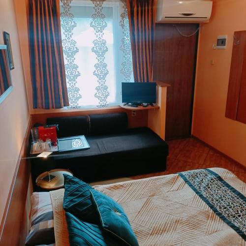 TV a/nebo společenská místnost v ubytování Vanilla Pokoje i Apartamenty Nad Brzegiem Jeziora