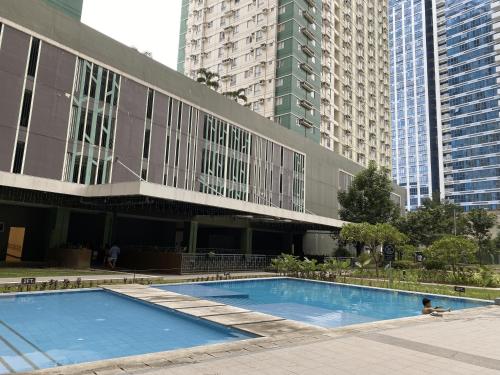 Bazén v ubytování Avida Riala 1BR unit- IT Park Cebu City nebo v jeho okolí