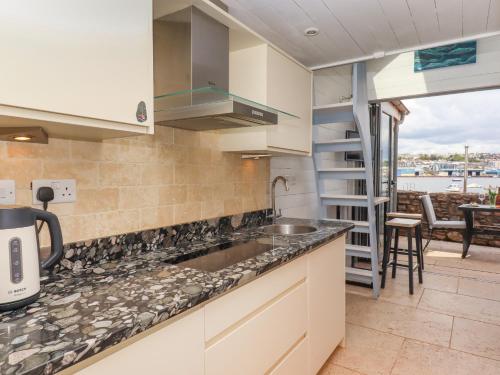Kuchyň nebo kuchyňský kout v ubytování Beach Hut 5