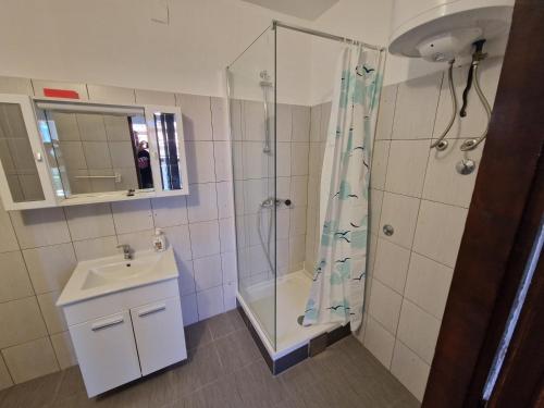 Koupelna v ubytování Apartments Mate