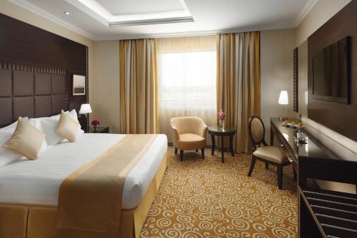 Movenpick Hotel Qassimにあるベッド