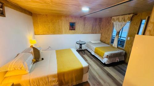 Ένα ή περισσότερα κρεβάτια σε δωμάτιο στο Casa Ñawi