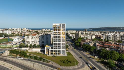 an aerial view of a city with a tall building at Hotel Campus 90 - Free Parking in Varna City