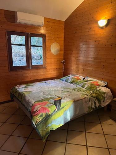 Postel nebo postele na pokoji v ubytování Villa Ô Pieds Nus 180m2 4 chambres piscine jardin tropical parking privé