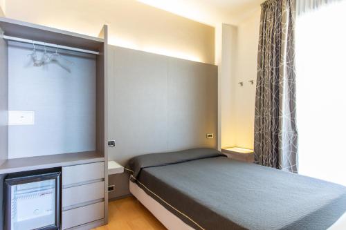 Cama o camas de una habitación en Hotel Baltic Riccione-Fronte Mare