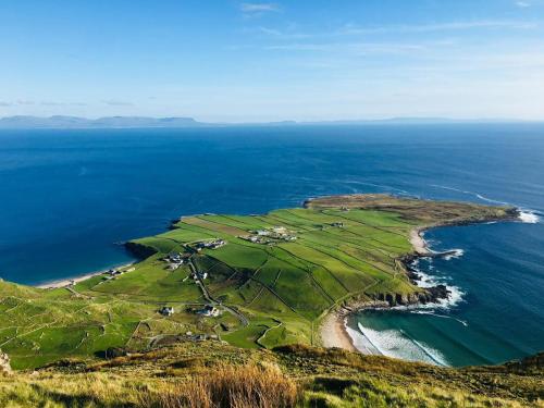 an aerial view of an island in the ocean at Memory Lane Self Catering Cottage in Muckros