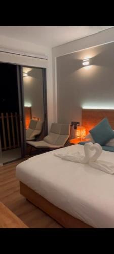 Una cama o camas en una habitación de BAGEECHAA STAY