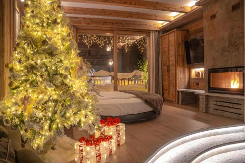 Una cama o camas en una habitación de Le Chalet Suite Livigno