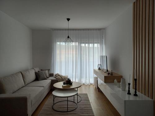 Coin salon dans l'établissement Apartman Filip