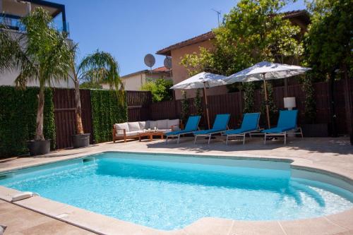 Πισίνα στο ή κοντά στο Stunning Juan Les Pins 4 bed Villa with Pool